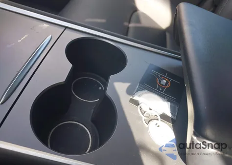 2023 Tesla Model Y Rwd из США, поврежденный, VIN 7SAYGDED0PF978241